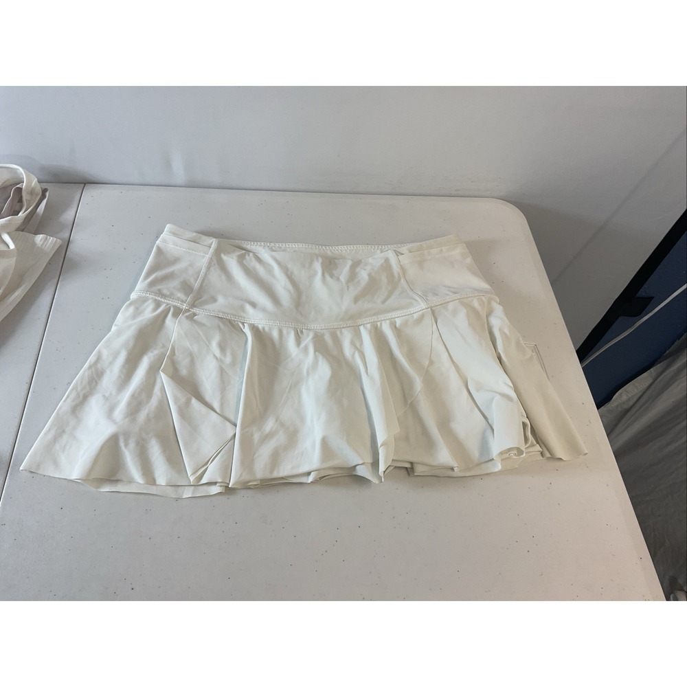 lululemon size 8  T LOT  4 Pieces, white skort, maroon hotty hot, tanks - Picture 2 of 16